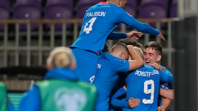Albert Gudmundsson celebrates with his teammates after scoring Iceland's third goal. AP