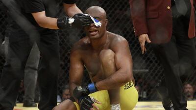 Anderson Silva gets his face wiped down after losing his light heavyweight bout against Daniel Cormier at UFC 200, Saturday, July 9, 2016, in Las Vegas. John Locher / AP Photo
