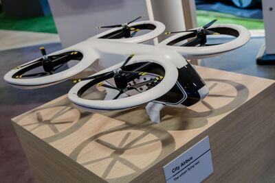 A model of a City Airbus flying taxi. Such vehicles re more likely to be adopted because they are quieter than personal jetpacks. Marlene Awaad/Bloomberg