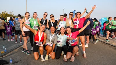 Participants celebrate after A Run for Hope on Saadiyat Island