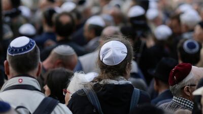 Protesters attend march against anti-Semitism. AP