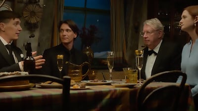 The Weasley family reunite around the dinner table. From left, James Phelps (Fred Weasley), Oliver Phelps (George Weasley), Mark Williams (Arthur Weasley) and Bonnie Wright (Ginny Weasley).