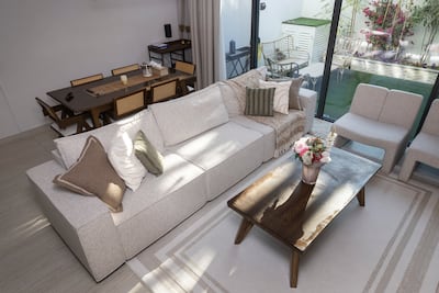 Minimalist interiors at Nihar and Prerna Desai's four-bedroom villa. Antonie Robertson / The National