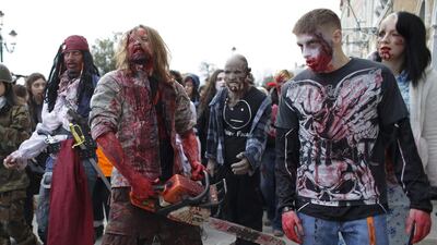 People dressed as zombies take part in a “Zombie Walk.” Max Rossi / Reuters