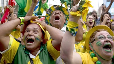 Brazil football shirts outsell all other merchandise at sports retailer Sun & Sand Sports. Rodrigo Abd / AP Photo