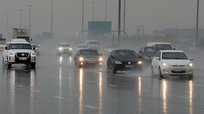 Traffic on Al Khail road during the rain in Dubai. Pawan Singh / The National