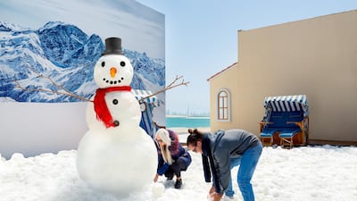 A snowman was built in the Heart of Europe to mark the hottest day ever recorded in the UAE. Courtesy The World