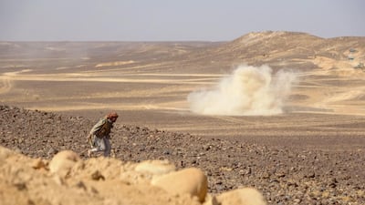 Smoke billows during clashes between forces loyal to Yemen's government and Houthi rebel fighters in Al Jadaan area about 50 kilometres north-west of Marib city in central Yemen on February 11, 2021. AFP