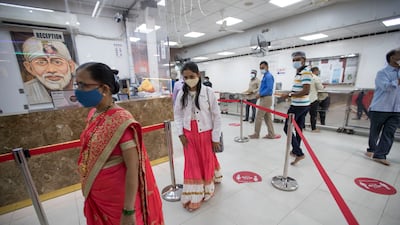 Signs urge social distancing at the Shiva Temple in Bur Dubai. All photos: Ruel Pableo/The National