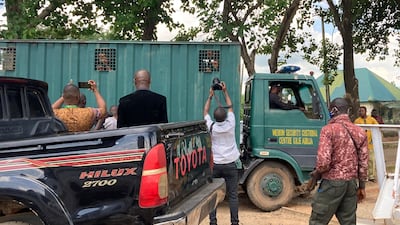 Recaptured inmates being taken back to Kuje maximum security prison. AP