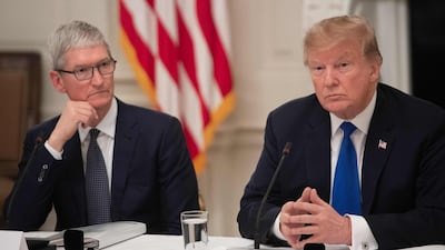In this file photo taken on March 6, 2019 President Donald Trump speaks alongside Apple CEO Tim Cook (L). Mr Trump said that Apple would be spending 'vast sums' of money in the US in a tweet ahead of a dinner meeting with Mr Cook last week. AFP