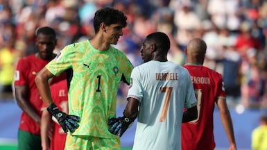 Ousmane Dembele of France with Morocco goalkeeper Yassine Bounou during their World Cup quarter-final in Boston. EPA