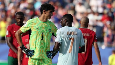 Ousmane Dembele of France with Morocco goalkeeper Yassine Bounou during their World Cup quarter-final in Boston. EPA