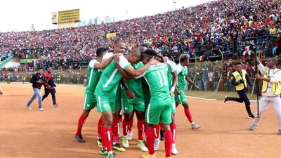 In this file photo, Madagascar players celebrate after scoring against Senegal during their Africa Cup of Nations 2019 qualifier in September. AFP