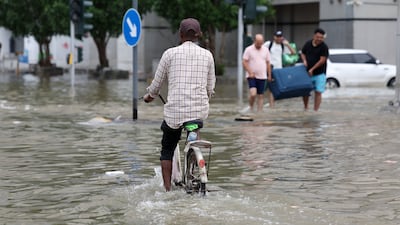 A flooded road in Sharjah after powerful storms swept across the country in March. Chris Whiteoak / The National