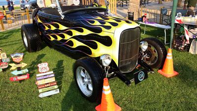 A 1931 Ford Highboy Roadster with a modern day drag race look at the Historical, Vintage and Classic Cars exhibition in Kuwait City.