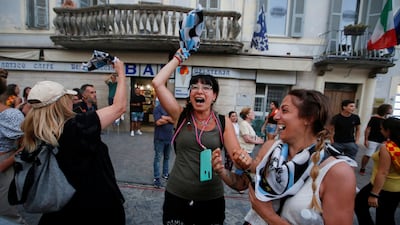 Fontana Grande parish supporters celebrate after their horse's victory.