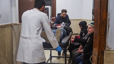 The wounded from Aleppo's violence on Monday night are taken for hospital treatment. Reuters