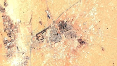 A false-color image from the European Commission's Sentinel-2 satellite shows Saudi Aramco's Abqaiq oil processing facility in Buqyaq, Saudi Arabia. Yemen's Houthi rebels claimed to have launched drone attacks on the world's largest oil processing facility in Saudi Arabia and a major oil field Saturday, sparking huge fires and halting about half of the supplies from the world's largest exporter of oil. Black char marks at the center of the facility suggest the attack struck at the heart of the processing facility. AP