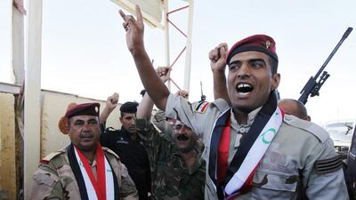 Major General Negm Abdullah Ali, left, commander of the Iraqi army's sixth division, was killed in fighting with insurgents in the Ibrahim Bin Ali area, about 16 kilometres from Baghdad. Ahmed Saad / Reuters