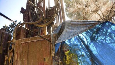Driller Justin Arney of Diamond Well Drillers drills to deepen the Brady family well. Max Whittaker / Reuters