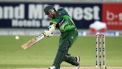 Kamran Akmal plays a shot for Pakistan during a Twenty20 match in Dubai in 2011. Pawan Singh / The National