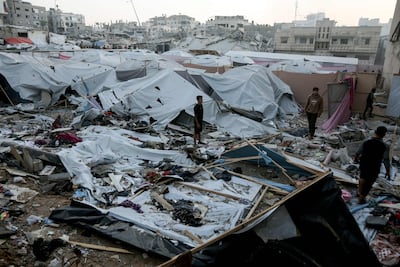 Tents where displaced Palestinians lived lie destroyed in an Israeli strike in Gaza city on Saturday. AFP