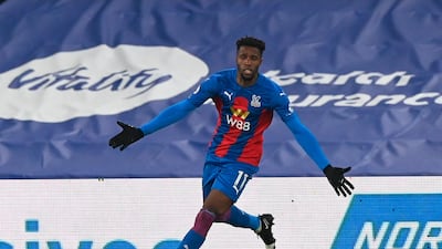 Crystal Palace's Wilfried Zaha celebrates after scoring against Leicester City on Monday. EPA