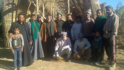 Craftsman Meeri Najim, in the middle in the second row. The craftsmen consider themselves the guardians of their unique history and culture which was nearly decimated by former dictator Saddam Hussein. Photo: Mr Najim