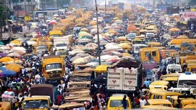 The need for better infrastructure in Africa is overshadowed by inefficiency and bureaucracy. Above, vehicles and people compete for space in a road in Lagos, Nigeria. Pius Utomi Ekpei / AFP