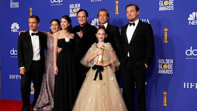 The cast of 'Once Upon A Time ... In Hollywood' pose with their Best Motion Picture - Musical or Comedy award, during the 77th annual Golden Globe Awards on January 5, 2020, at The Beverly Hilton hotel in Beverly Hills, California. Reuters