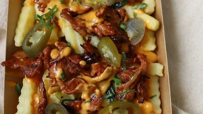 Spicy fries with chicken and cheese