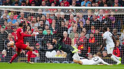 West Ham's Jarrod Bowen, bottom, scores his side's opening goal. AP