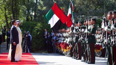 Sheikh Mohammed inspects the guard of honour with Mexican President, Enrique Peña Nieto. PRESIDENCIA / EPA
