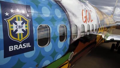 A long view of the Boeing 737 airplane the Brazilian national football team will travel on during the 2014 World Cup. Nacho Doce / Reuters / May 27, 2014