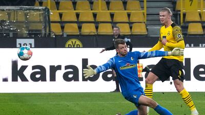 Dortmund's Erling Haaland scores against Freiburg during the Bundesliga match in January, 2022. AP
