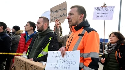 People offer transport for Ukrainian migrants in Przemysl, south-eastern Poland. EPA