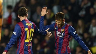 Neymar of Barcelona celebrate scoring with his teammate Lionel Messi during their La Liga win over Elche on Saturday. Queimadelos Alonso / Getty Images / January 24, 2015
