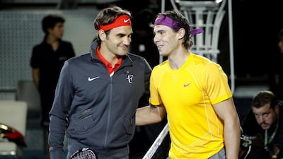 Roger Federer, left, with a game that bespeaks elegance, is a puritan’s delight, while Roger Nadal is the nemesis, the darling of the rebellious and irreverent Generation Y, our columnist writes. (AP Photo/Victor R. Caivano)