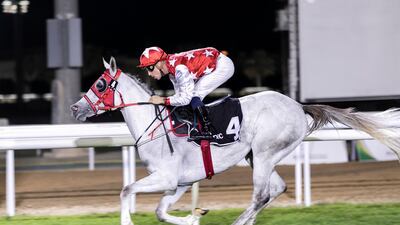 Fabrice Veron guides Dhafra to win the Abu Dhabi Fillies Classic on Sunday. Reem Mohammed / The National