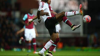 Timothy Fosu-Mensah of Manchester United is challenged by Dimitri Payet of West Ham United during the FA Cup, sixth round replay between West Ham United and Manchester United at the Boleyn Ground on April 13, 2016 in London, England. (Photo by Ian Walton/Getty Images)