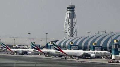 The traffic control tower is seen near the Emirates Terminal at Dubai International Airport. Reuters