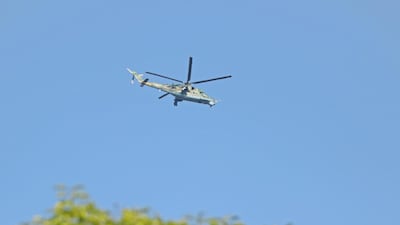 A military helicopter flies in Naypyitaw, Myanmar. EPA