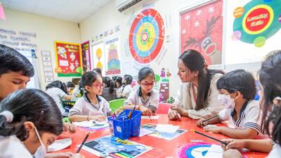 Ms Alamgir at work with the young schoolchildren. Ruel Pableo for The National