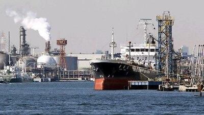 Japan is one of the few foreign players allowed into Abu Dhabi's closed concessions regime. Above, an oil loading platform in Kawasaki, west of Tokyo. Koji Sasahara / AP Photo