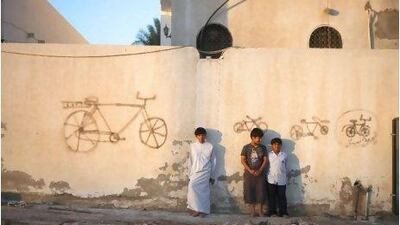 The writing is on the wall: bicycles are growing in popularity in the UAE with the rise of health-consciousness and an increase in gated communities, which provide a safe area for bikers. Galen Clarke / The National