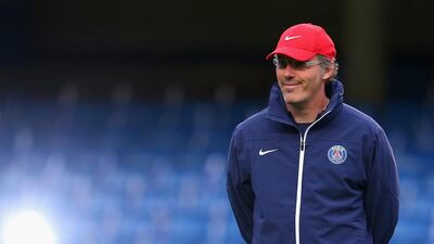 Laurent Blanc has led Paris Saint-Germain to a three-point advantage in Ligue 1 over Lyon with three to play. Julian Finney / Getty Images