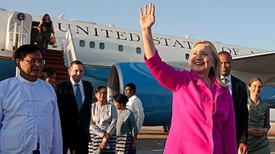 Hillary Clinton, the US secretary of state, is welcomed to Myanmar by the country’s deputy foreign minister Myo Myint, left, in Naypyitaw yesterday.