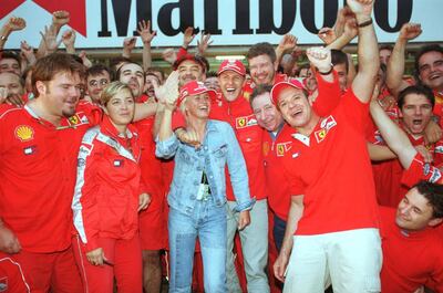Corinna Schumacher with Michael and the rest of the Ferrari team. Getty Images