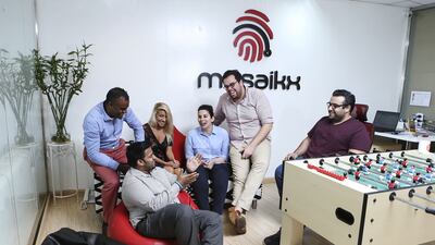 Members of the Mosaikx team are photographed at the Mosaikx office in Dubai. Sarah Dea / The National